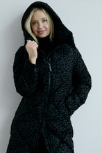 Load image into Gallery viewer, Person wearing a black leopard print hooded coat against a plain background
